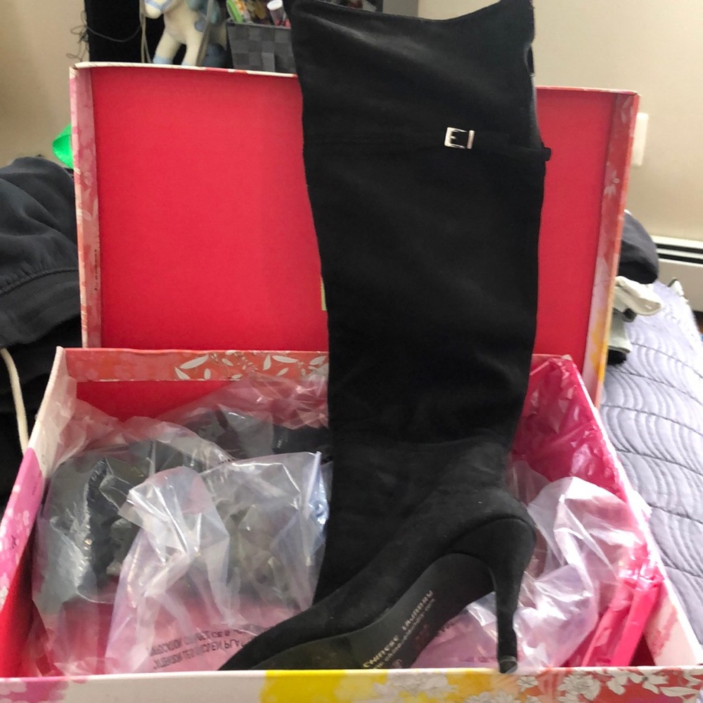 Over the knee black boots